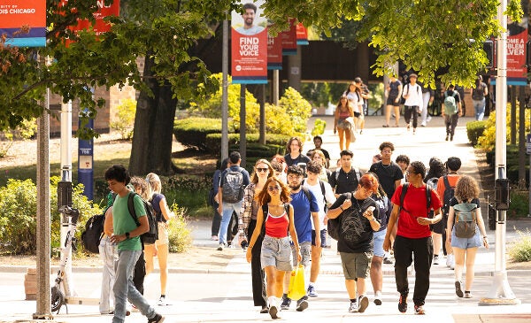 Students walking on campus on the first day of fall semester